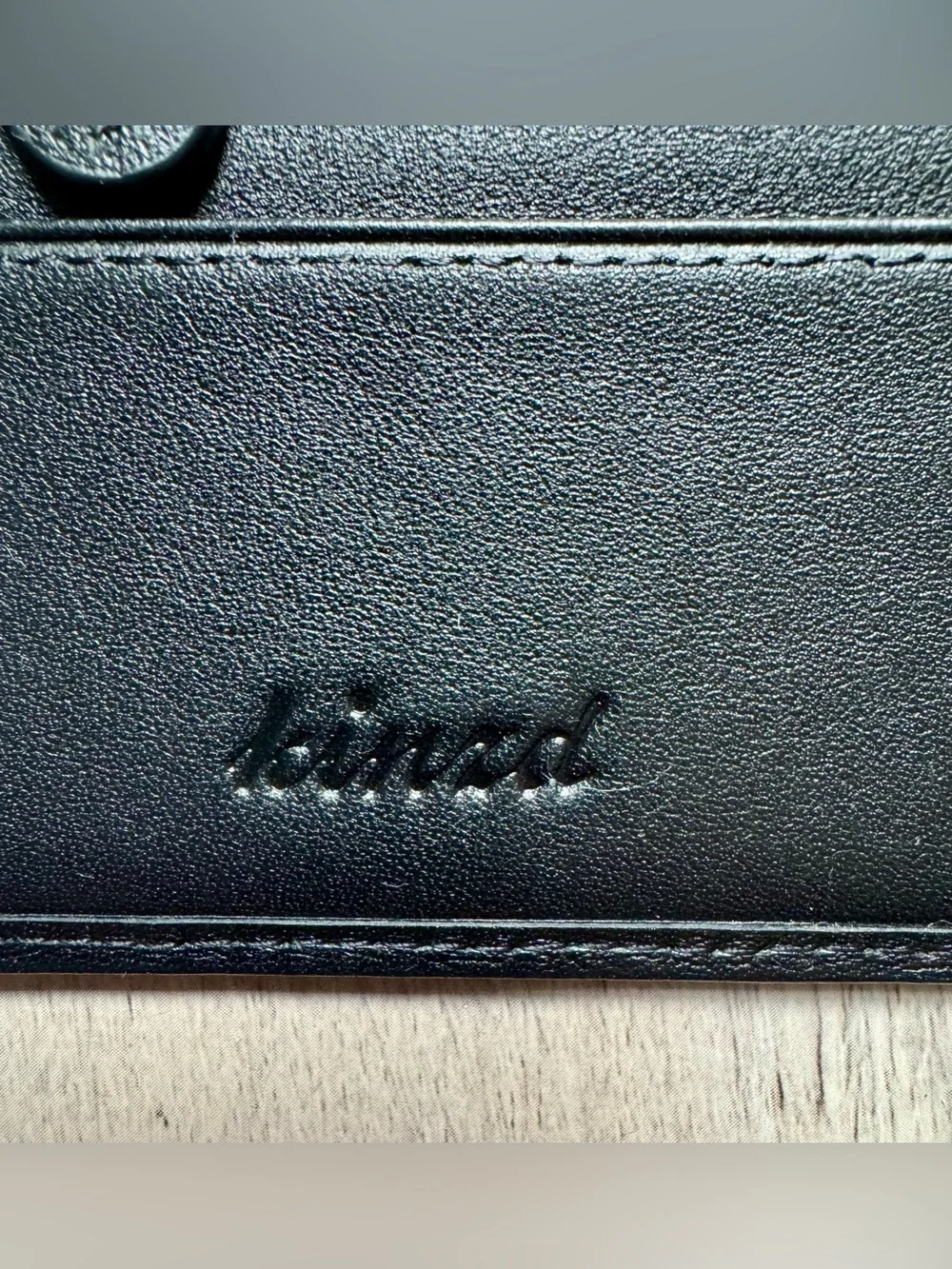 Kinzd minimalist leather card holder by Kinzd, featuring a zippered compartment